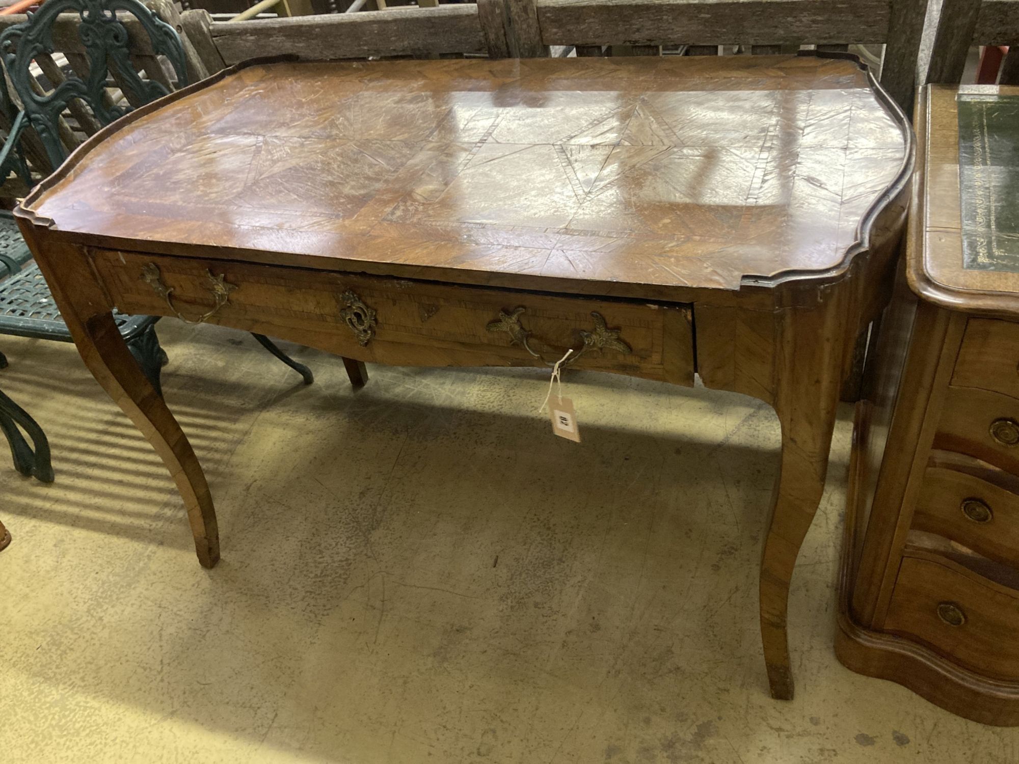 A Louis XV kingwood veneered side table, fitted one long drawer (requiring restoration), width 118cm, depth 63cm, height 79cm